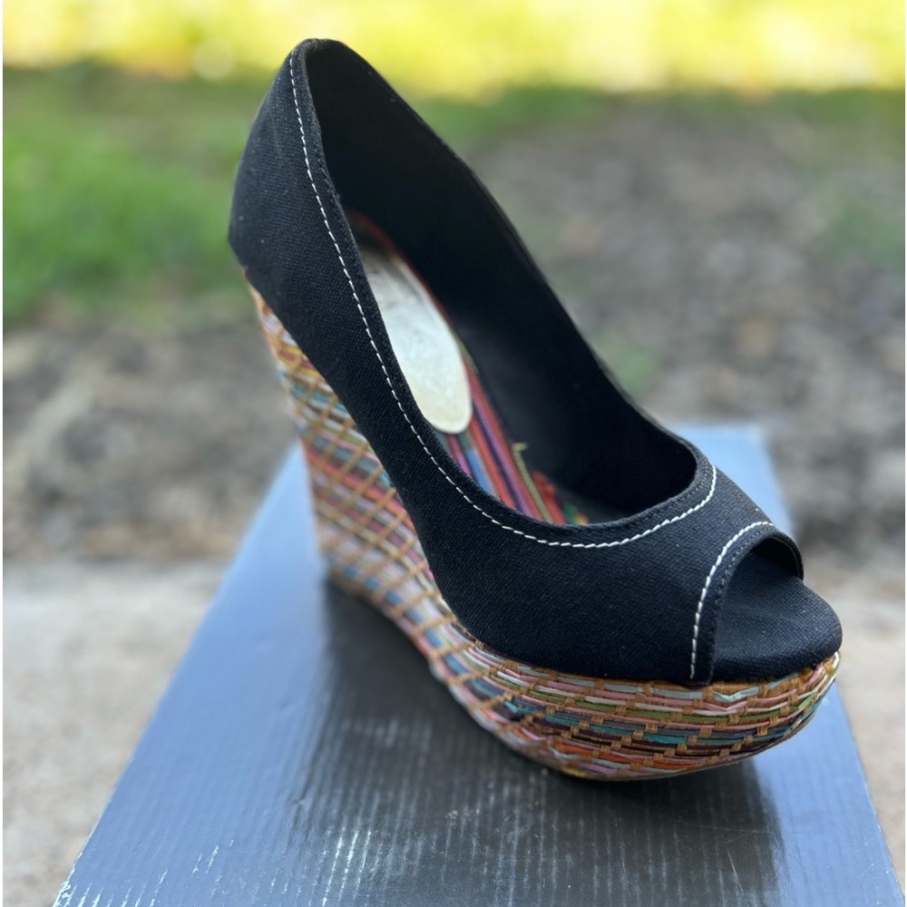 Speed limit 98 black wedge heels with multi color edge .new in the box size 7